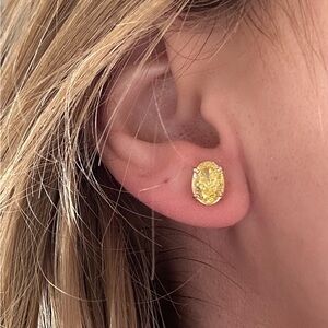 2.59 CTW fancy vivid yellow oval lab diamond stud earrings